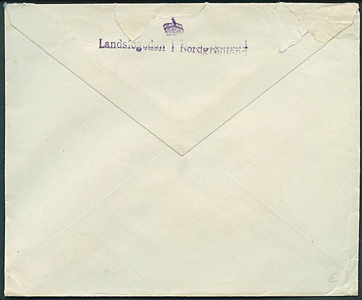 20 øre Chr. X på brev fra Godhavn d. 5.10.1947 til København. På bagsiden stemplet (krone) / Landsfogeden i Nordgrønland. Urent åbnet i toppen.