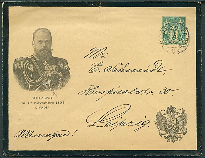 5 c. helsagskuvert med tiltrykt sørgerand og billede af zar Aleksander 3. af Rusland sendt som tryksag fra Paris d. 5.3.1895 til Leipzig, Tyskland. Nålehul.