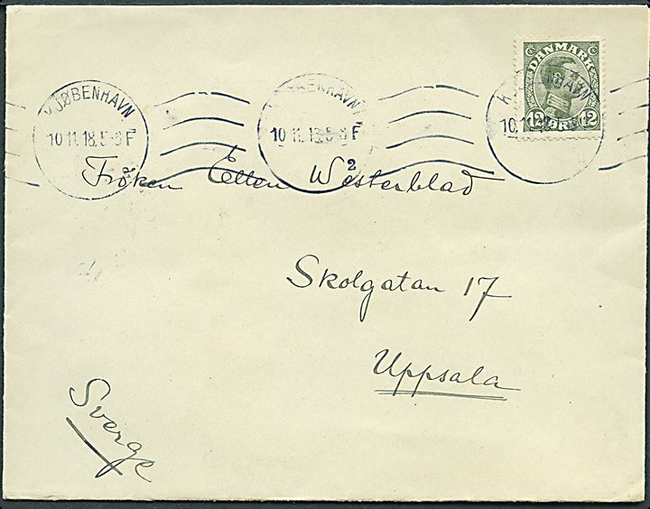 12 øre Chr. X med variant Farveplet over øre single på brev fra Kjøbenhavn d. 10.11.1918 til Uppsala, Sverige. (Pos. 45 i del af oplaget).