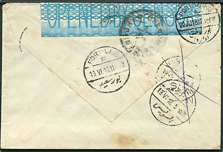 5 øre Chr. X (4) på brev fra Kjøbenhavn d. 11.5.1918 til sømand ombord på M/S Tonking - eftersendt til Singapore, Suez og Hull. Åbnet af egyptisk censur med flere transit stempler.