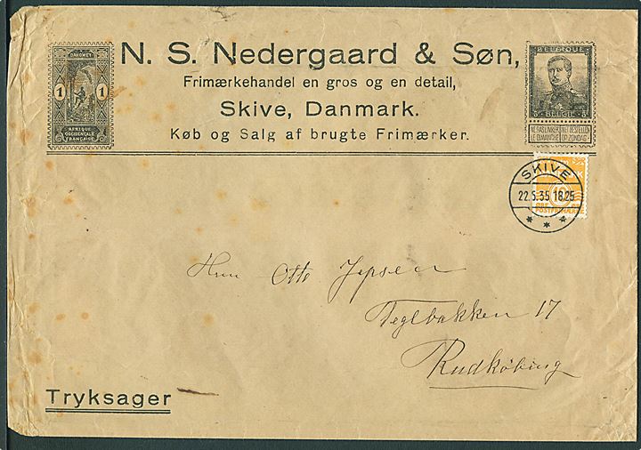 10 øre Bølgelinie på illustreret firmakuvert fra frimærkehandler N. S. Nedergaard sendt som tryksag fra Skive d. 22.5.1935 til Rudkøbing.