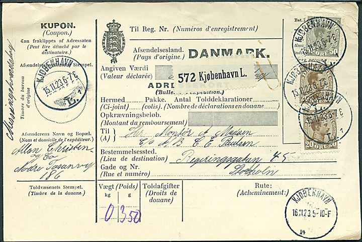 20 øre (2) og 50 øre Chr. X på 90 øre frankeret internationalt adressekort for pakke fra Kjøbenhavn d. 15.11.1923 til Stockholm, Sverige.