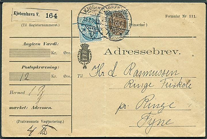 16 øre Tofarvet 31. tryk og 20 øre Våben på adressebrev for pakke fra Kjøbenhavn d. 26.2.1902 til Ringe Friskole. Lodret fold.