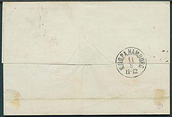 4 sk. stukken kant på brev fra Kjøbenhavn annulleret med kombineret nr.stempel 1812/SJ.JB.P.SP.B. d. 18.8.1863 til Hamburg. På bagsiden lapidar K.D.O.P.A. Hamburg d. 14.8.1863.