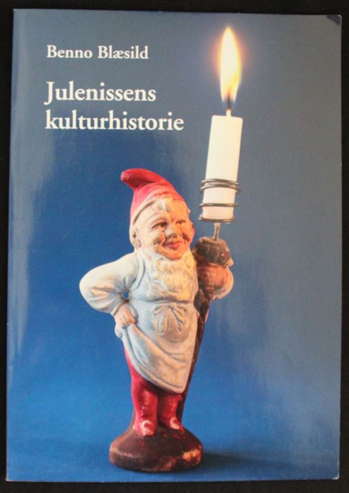 Julenissens kulturhistorie af Benno Blæsild. 22 sider hæfte fra den Gamle By illustreret med bl.a. gamle postkort. Uden år.