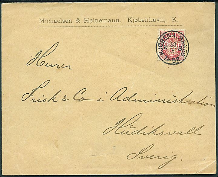 10 øre Våben med berfin M&H på fortrykt kuvert fra Michaelsen & Heinemann annulleret med lapidar Kjøbenh. Baneg. d. 30.8.1900 til Hudiksvall, Sverige.