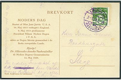 10 øre Bølgelinie på brevkort (Thor Bøgelund: Moders Dag) annulleret m. violet særstempel København Omk. / 12 Maj / Modersdag d. 2.5.1929 til Stege. Iflg. tekst er afsenderen på Blomsterudstilling. 