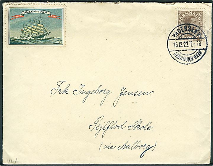 20 øre Chr. X på brev med julemærke 1922 og indhold dateret Halk annulleret med bureaustempel Haderslev - Aarøsund Havn T.18 d. 15.12.1922 til Sejlflod skole via Aalborg. Pænt aftryk.