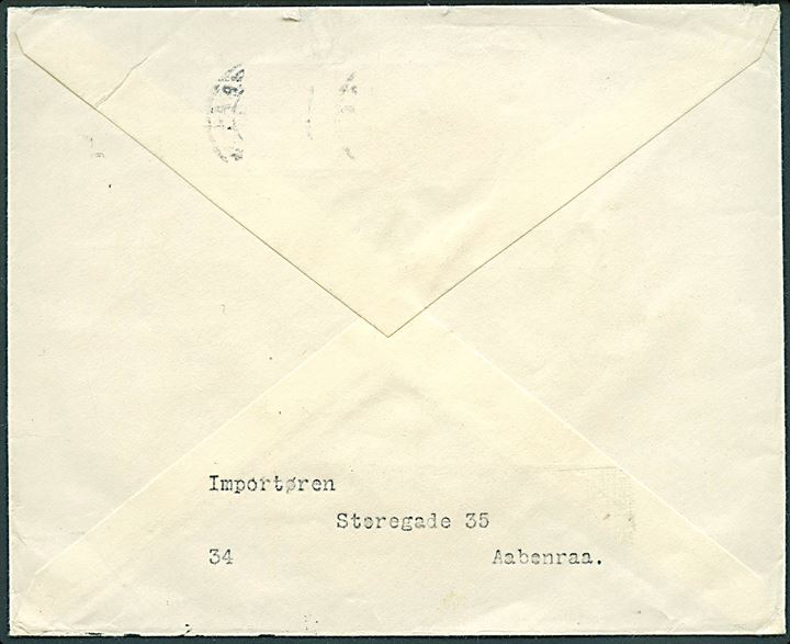 5+10 øre Røde Kors provisorium i lodret parstykke - nedre mærke med variant “bombe mod Rundetårn” - på brev fra Aabenraa d. 6.7.1949 til København. 