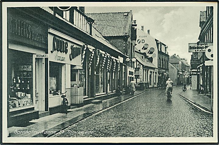 Bornholm. Rønne. St. Torvegade med butikker. Rudolf Olsens Kunstforlag no. 7936. 