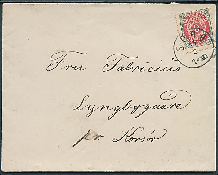 8 øre Tofarvet på brev annulleret med lapidar Sorø d. 15.5.18xx til Lyngbygaard pr. Korsør.