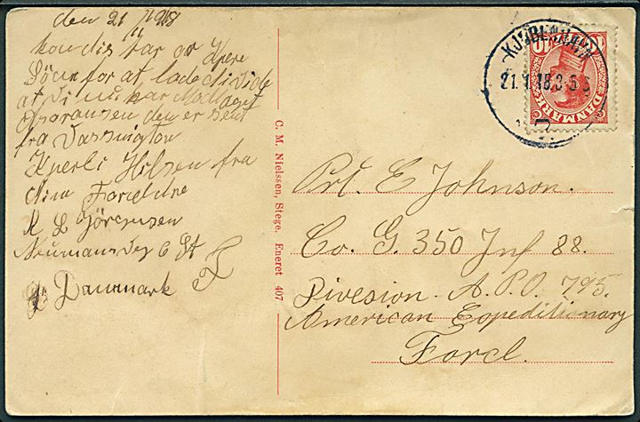 10 øre Chr. X på brevkort (Gadeparti fra Kallehave) stemplet Kjøbenhavn d. 21.11.1918 til dansk-asmerikansk soldat i Co. C., 350th Infantry Regiment, 88th Division, American Expeditionery Force i Frankrig. 