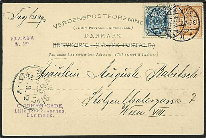 4 øre Tofarvet og 1 øre Våbentype på brevkort sendt som tryksag fra Aarhus II d. 18.9.1902 til Wien, Østrig.