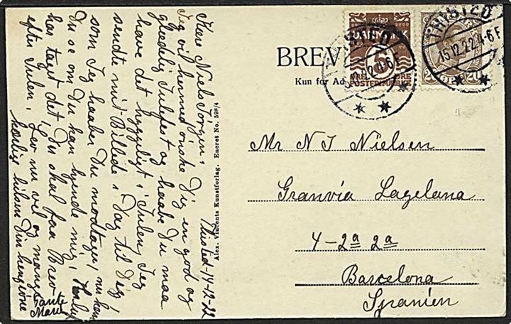 5 øre Bølgelinie og 20 øre Chr. X, samt på bagsiden Julemærke 1922, på brevkort fra Thisted d. 15.12.1923 til Barcelona, Spanien.
