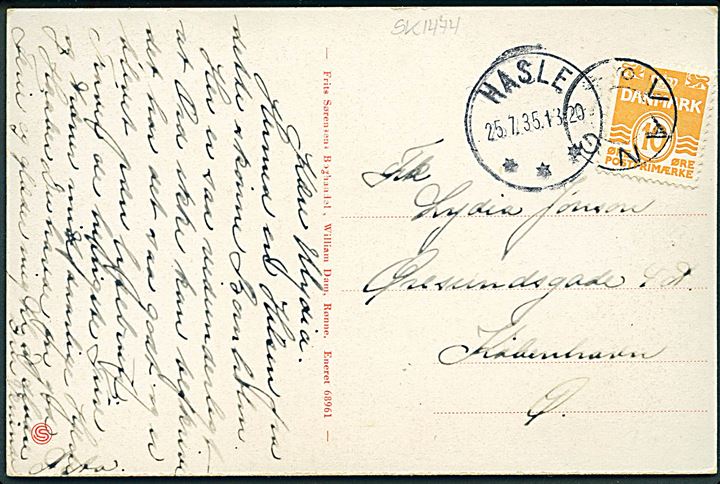 10 øre Bølgelinie på brevkort annulleret med udslebet stjernestempel VANG og sidestemplet Hasle d. 25.7.1935 til København.