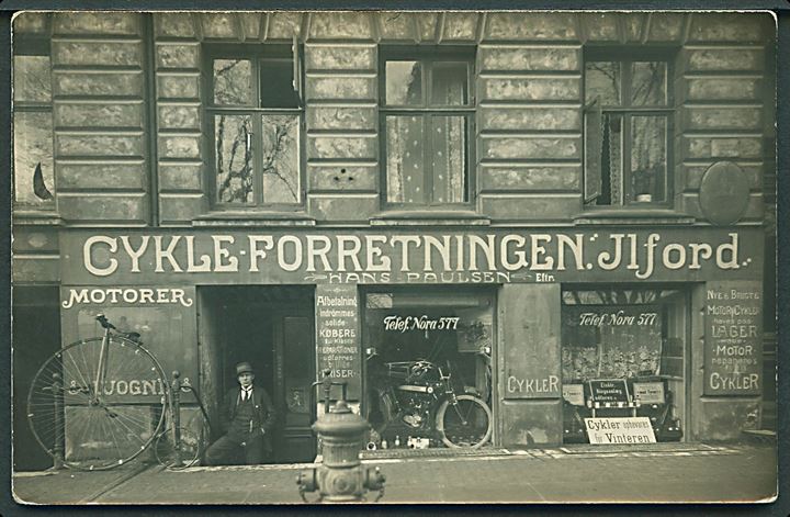 Købh., Nørre Allé 9 “Cykelforretningen Ilford” med ejer Chr. Bohnstedt-Petersen. (Sen. direktør og bilimportør) Kvalitet 7