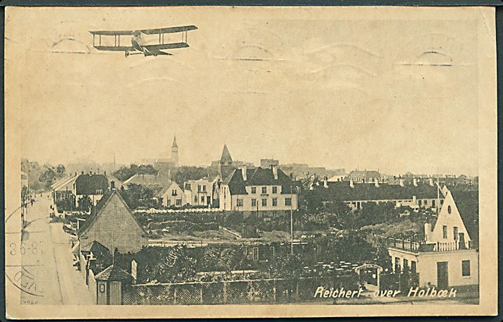 Otto Reichert med sin flyvemaskine over Holbæk. Ringhuus u/no. Kvalitet 7