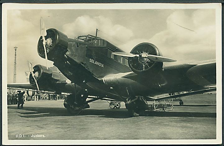 Junkers Ju 52/3m “Selandia” OY-DAL fra Det danske Luftfartsselskab (DDL). Reklamekort. A. Vincent u/no.  Kvalitet 9