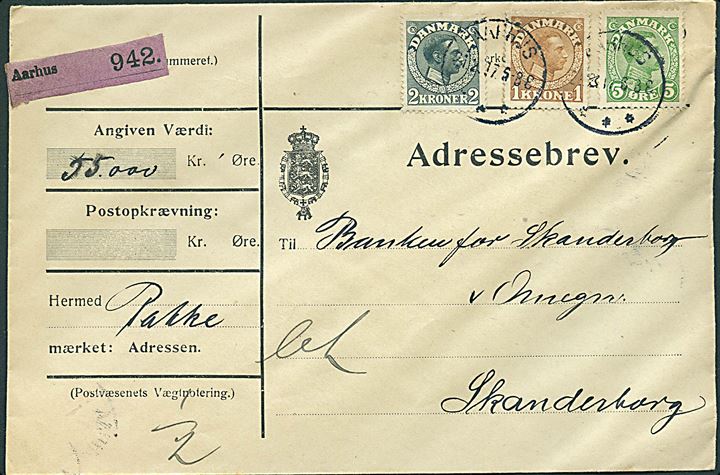 5 øre, 1 kr. og 2 kr. Chr. X på 305 øre frankeret adressebrev for værdipakke fra Aarhus d. 21.2.1917 til Skanderborg. Påskrevet Let.