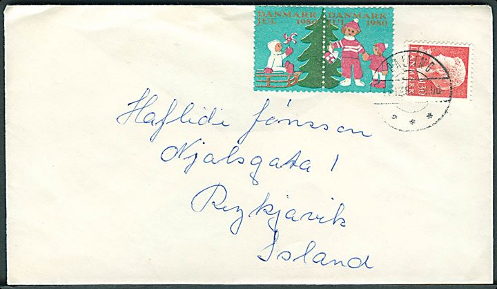 130 øre Margrethe og Julemærke 1980 i parstykke på brev fra Balling d. 15.12.1980 til Reykjavik, Island.