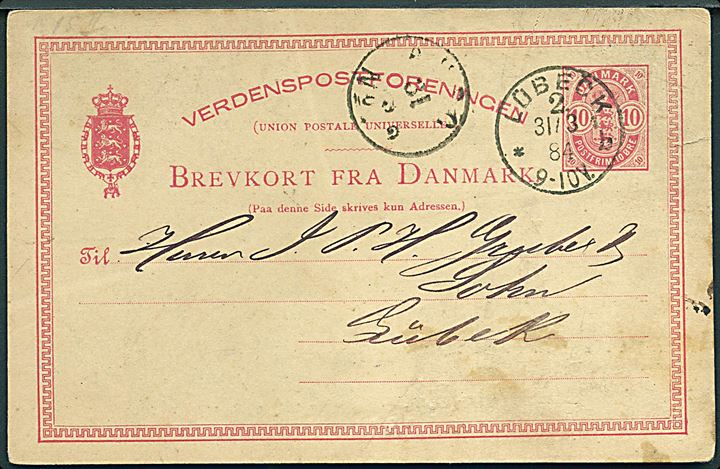 10 øre Våben helsagsbrevkort små hj.tal fra Kjøbenhavn annulleret med tysk stempel i Lübeck 2 d. 31.3.1884 til Lübeck, Tyskland.