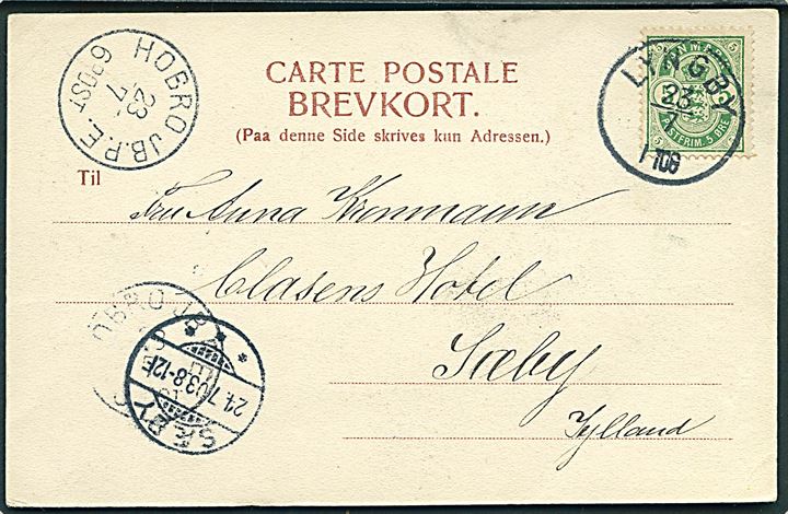 5 øre Våben på brevkort (Frederiksdal kro) annulleret med lapidar Lyngby d. 23.7.1903 til Sæby. Fejlsendt med lapidar Hobro JB.P.E. d. 23.7.1903.