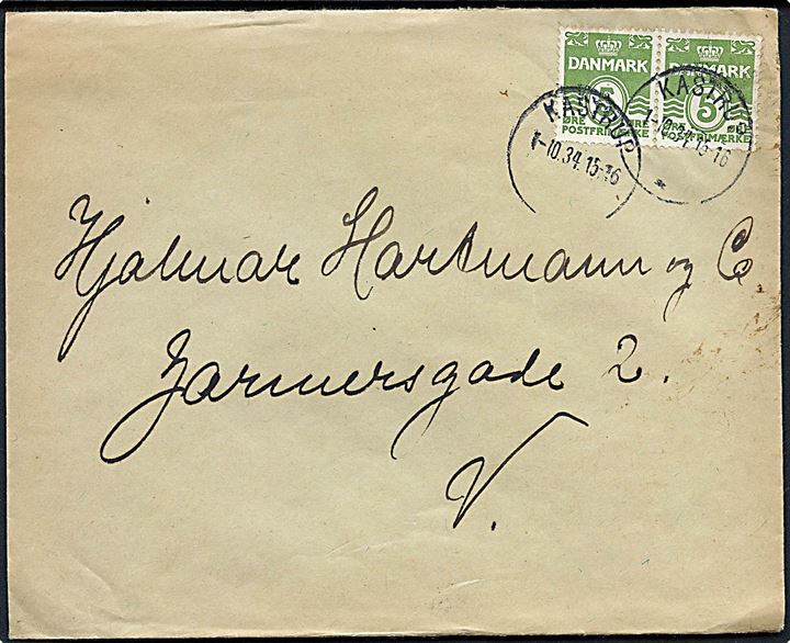 5 øre Bølgelinie i parstykke på brev annulleret med brotype IIIc Kastrup d. 1.10.1934 til København.