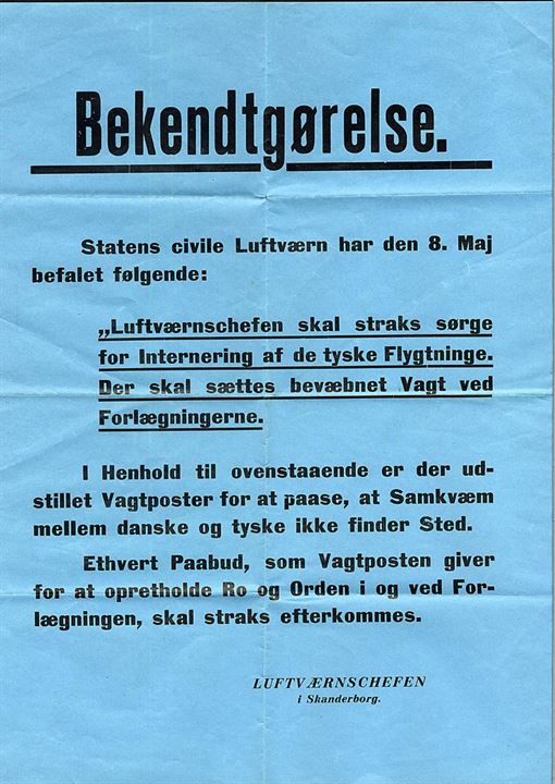 Bekendtgørelse fra Statens civile Luftværn d. 8.5.1945 vedr. internering af tyske flygtninge. Underskrevet Luftværnschefen i Skanderborg. (35x43 cm).
