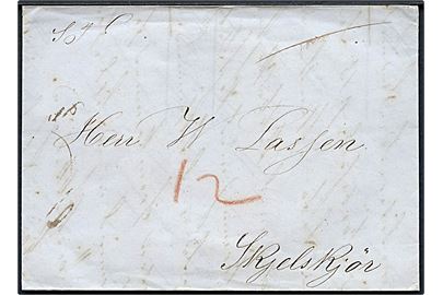 1847. Portobrev med blåligt antiqua Kjøbenhavn d. 25.10.1847 til Skjelskjör. Påskrevet 12 sk. porto. Fuldt indhold.