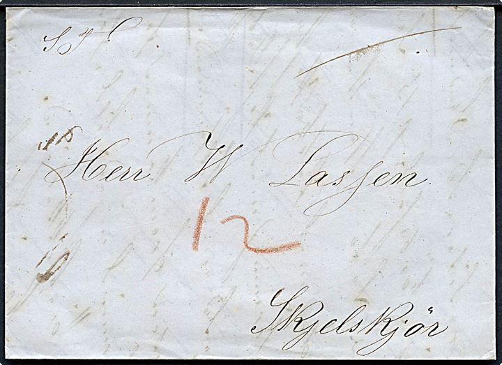 1847. Portobrev med blåligt antiqua Kjøbenhavn d. 25.10.1847 til Skjelskjör. Påskrevet 12 sk. porto. Fuldt indhold.