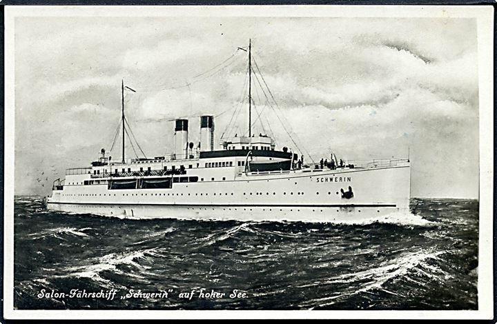 15 øre Chr. X 60 år på brevkort (Salon-Fährschiff Schwerin) annulleret med tysk skibsstempel Deutsche Seepost Gjedser-Warnemünde F.h. d. 22.9.1931 til Arnsdorf i Böhmen, Tjekkoslovakiet.
