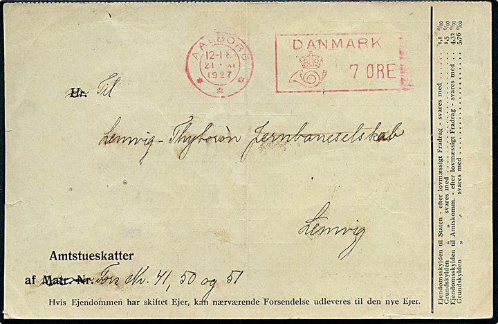 7 øre posthusfranko på tryksag med opkrævning af amtsstueskat stemplet Aalborg d. 21.11.1927 til Lemvig-Thyborøn Jernbaneselskab i Lemvig.