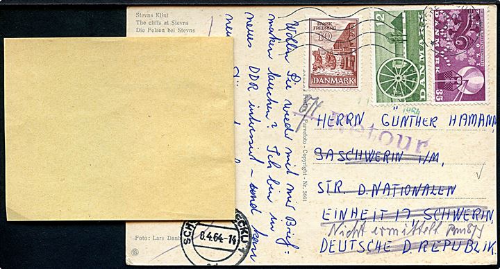 10 øre Dansk Fredning, 12 øre Landbrug og 35 øre Tivoli på brevkort fra Store-Heddinge d. 28.3.1964 til Schwerin, Østtyskland. Retur via Returpostkontoret med 2-sproget etiket Unbekannt.
