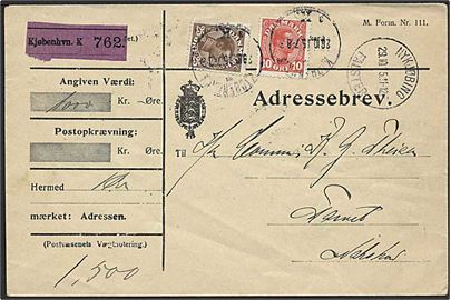 10 øre og 25 øre Chr. X på adressebrev for værdipakke fra Kjøbenhavn d. 28.10.1915 via Nykjøbing F. til Nakskov.