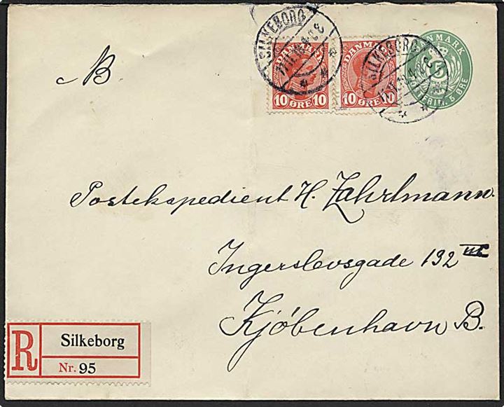 5 øre helsagskuvert opfrankeret med 10 øre Chr. X i parstykke sendt anbefalet fra Silkeborg d. 11.11.1918 til København.