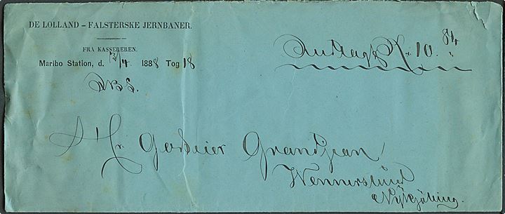 Jernbanesag påskrevet JBS fra de Lolland-Falsterske Jernbaner i Maribo d. 3.4.1888 indlagt 10,84 kr. til Wennerslund pr. Nykjøbing. Vedr. godtgørelse for billet Berlin-Nykjøbing som kun er benyttet til Warnemünde pga. ishindringer. Usædvanlig forsendelse.