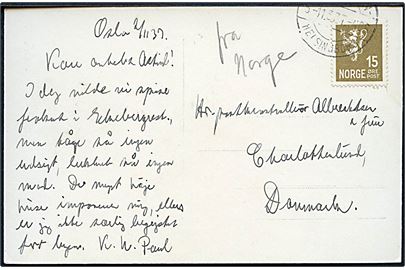 Norsk 15 øre Løve på brevkort fra Oslo annulleret med dansk bureaustempel København - Helsingborg T.406 d. 3.11.1937 og påskrevet Fra Norge til Charlottenlund, Danmark.