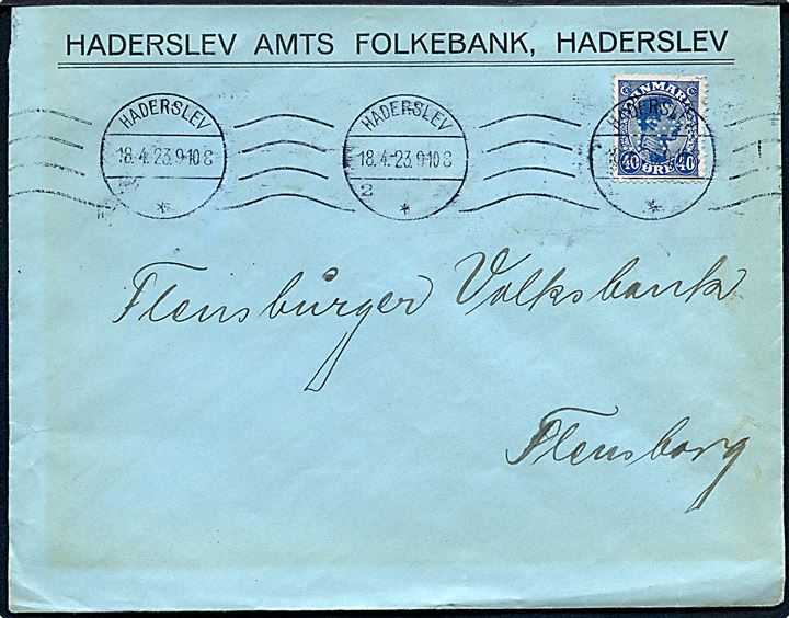 40 øre Chr. X med perfin H.A.F. på firmakuvert fra Haderslev Amts Folkebank i Haderslev d. 18.4.1923 til Flensburg, Tyskland.