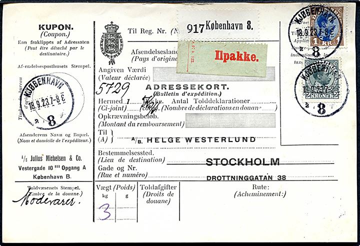 1 kr. og 2 kr. Chr. X på adressekort for ilpakke fra Kjøbenhavn 8 (= Københavns Frihavn) d. 18.9.1923 til Stockholm, Sverige.