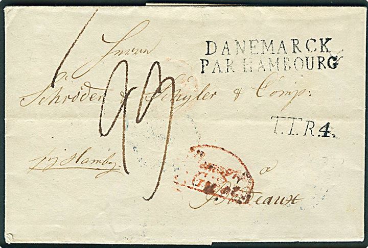 1838. Francobrev med håndskrevet bynavn på bagsiden “Ploen 29/8 38” påskrevet “Frÿ Hambg.” via Paris d. 29.8.1838 til Bordeaux, Frankrig. Sort “T.T.R.4” og “Danemarck par Hambourg”, samt rødt grænsestempel “Allemagne par Givet”. 