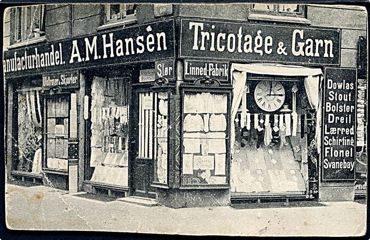 København, hjørne af Burmeistersgade 2 og Prinsessegade 55. Manufakturhandel A. M. Hansen (Anne-Marie) - Tricotage & Garn. U/no. (Med fejl). 