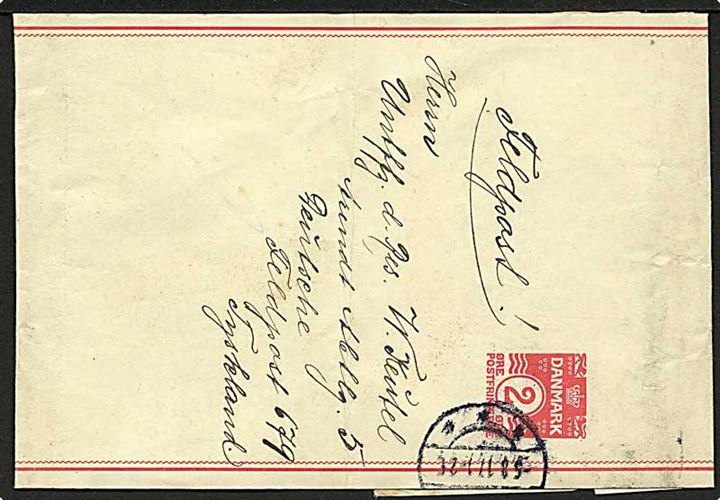 2 øre helsagskorsbånd stemplet d. 5.8.1917 påskrevet Feldpost og sendt til underofficer ved Arendt Abteilung 5 (Lytte-afdeling), Deutsche Feldpost 679, Tyskland. Usædvanlig destination. Folder.