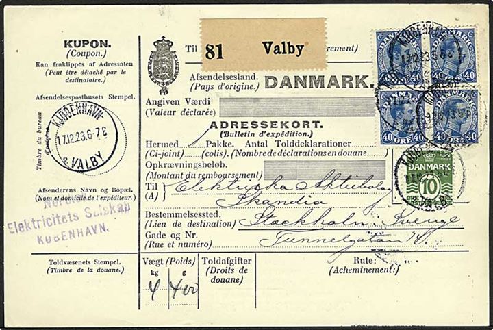 10 øre Bølgelinie og 40 øre Chr. X i to parstykker på 1,70 kr. frankeret internationalt adressekort for pakke fra Kjøbenhavn Valby d. 17.12.1923 til Stockholm, Sverige.