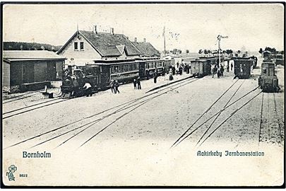 Aakirkeby, jernbanestation med holdende damptog. P. Alstrup no. 3632.