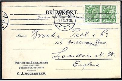 5 øre Chr. X i parstykke med perfin C.J.A. på brevkort fra firma C. J. Aggerbeck i Horsens d. 1.7.1915 til London, England.