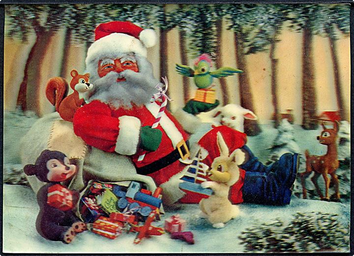 3D kort. Julemanden iført rød kåbe sidder i skoven sammen med dyrene. PAT. 591219. 