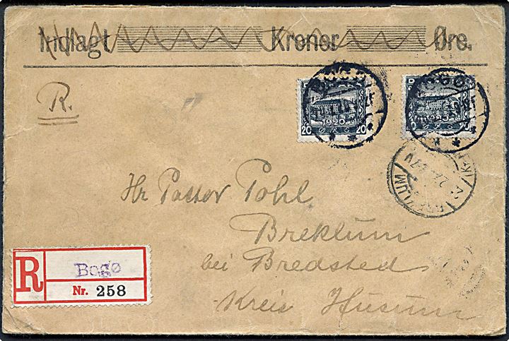 20 øre Genforening (2) på anbefalet brev annulleret med uldent brotype IIa Bogø d. 20.2.1922 til Bredstedt, Tyskland. Blanko rec.-etiket med liniestempel Bogø.