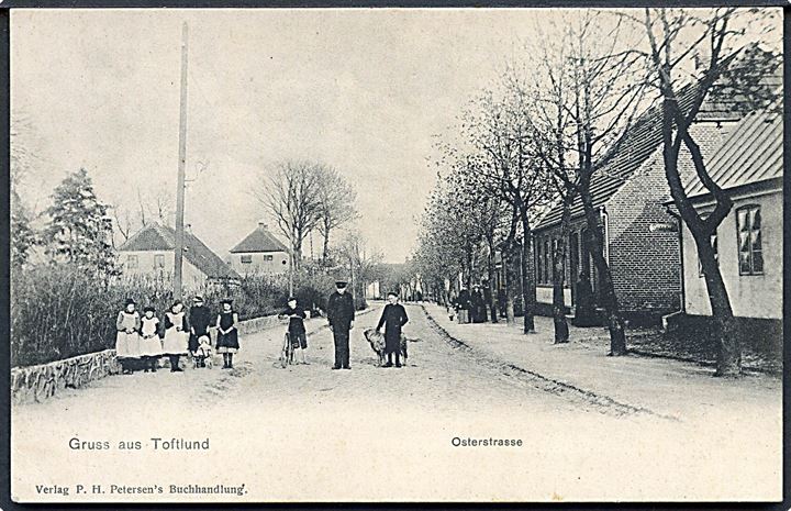Toftlund, Gruss aus med Osterstrasse. P. H. Petersen u/no.