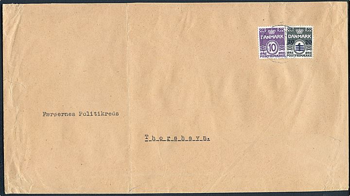 10 øre Bølgelinie og 20/1 øre Provisorium på aflang kuvert fra Sysselmanden for Nordøernes Syssel annulleret med svagt stempel Klaksvig Færøerne d. 20.5.1941 til Færøernes Politikreds i Thorshavn.
