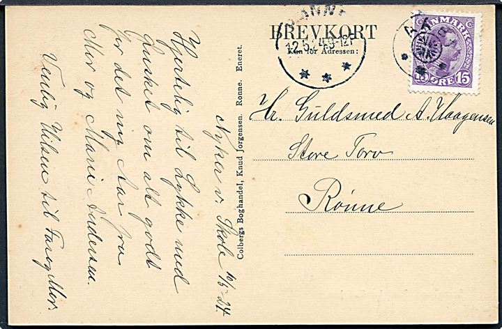 15 øre Chr. X på brevkort (Gadeparti fra Gudhjem) annulleret med stjernestempel AABY og sidestemplet Rønne d. 12.5.1924 til Rønne.